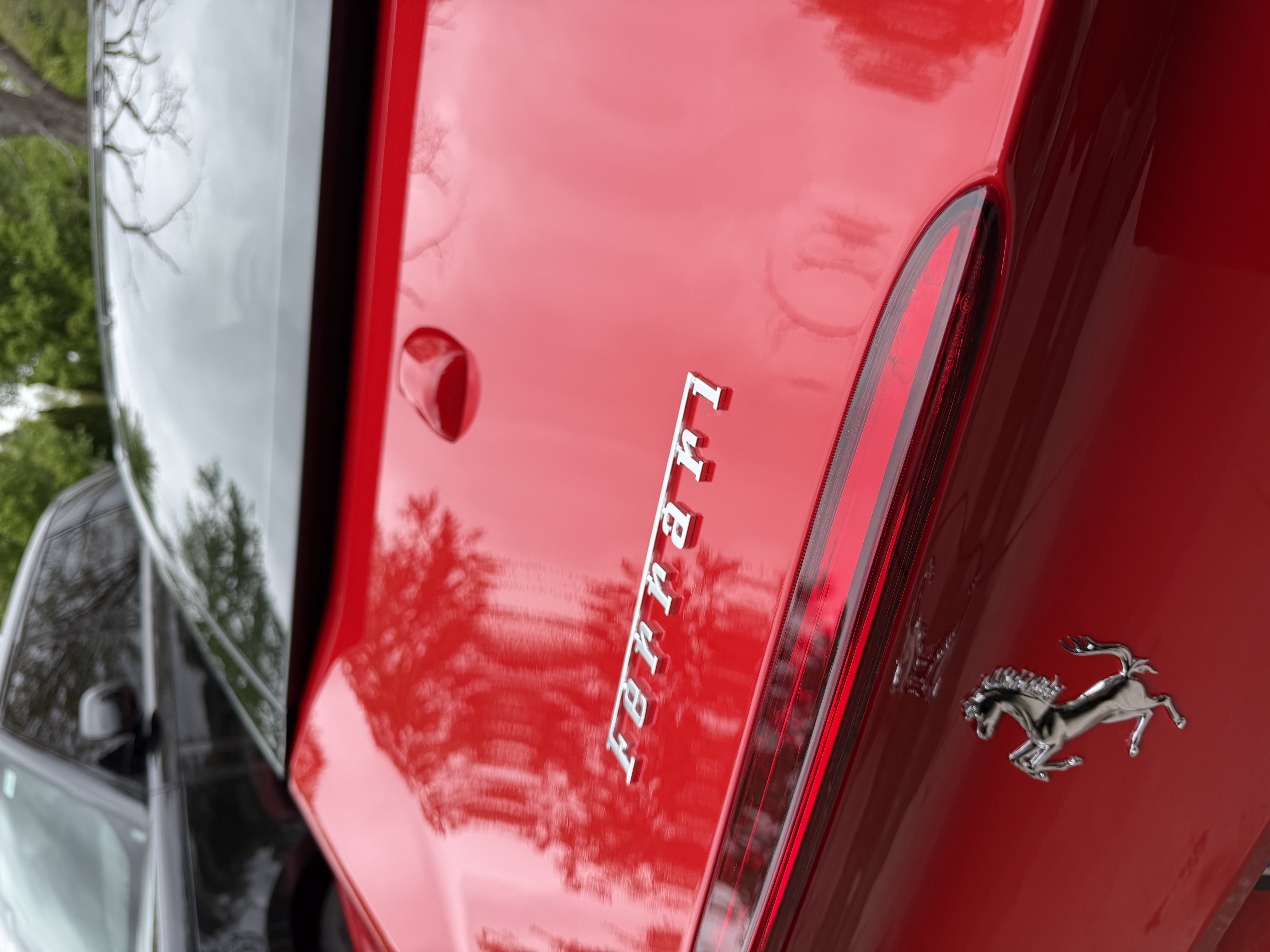Ferrari rear badge and panel after exterior detail